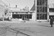 Black and white photo of the McDonalds storefront on Lake Street