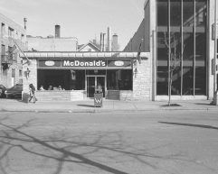 Black and white photo of the McDonalds storefront on Lake Street