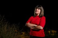 Melinda Soares against a starry night sky.