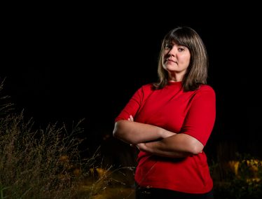 Melinda Soares against a starry night sky.