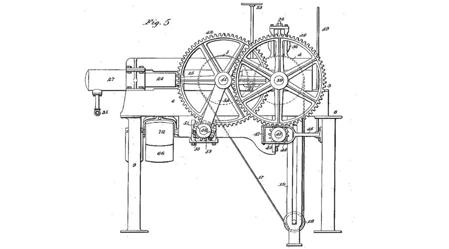 Black and white patent drawing of a cotton baling press with two large interlocking gears and labeled components.