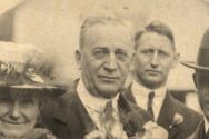 Sepia-toned photograph of Magnus Swenson wearing a coat and tie.