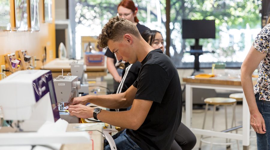 College of Engineering students works on details of the assistive mobility device.