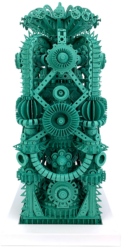 A highly detailed, intricate green paper sculpture resembling a complex mechanical structure with numerous gears, cogs, and symmetrical patterns.
