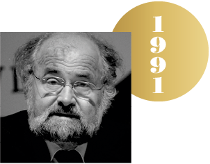 Black and white headshot of Erwin Neher with an overlapping gold circle representing a Nobel medal, with the year 1991 on it.