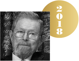 Black and white headshot of George P. Smith with an overlapping gold circle representing a Nobel medal, with the year 2018 on it.